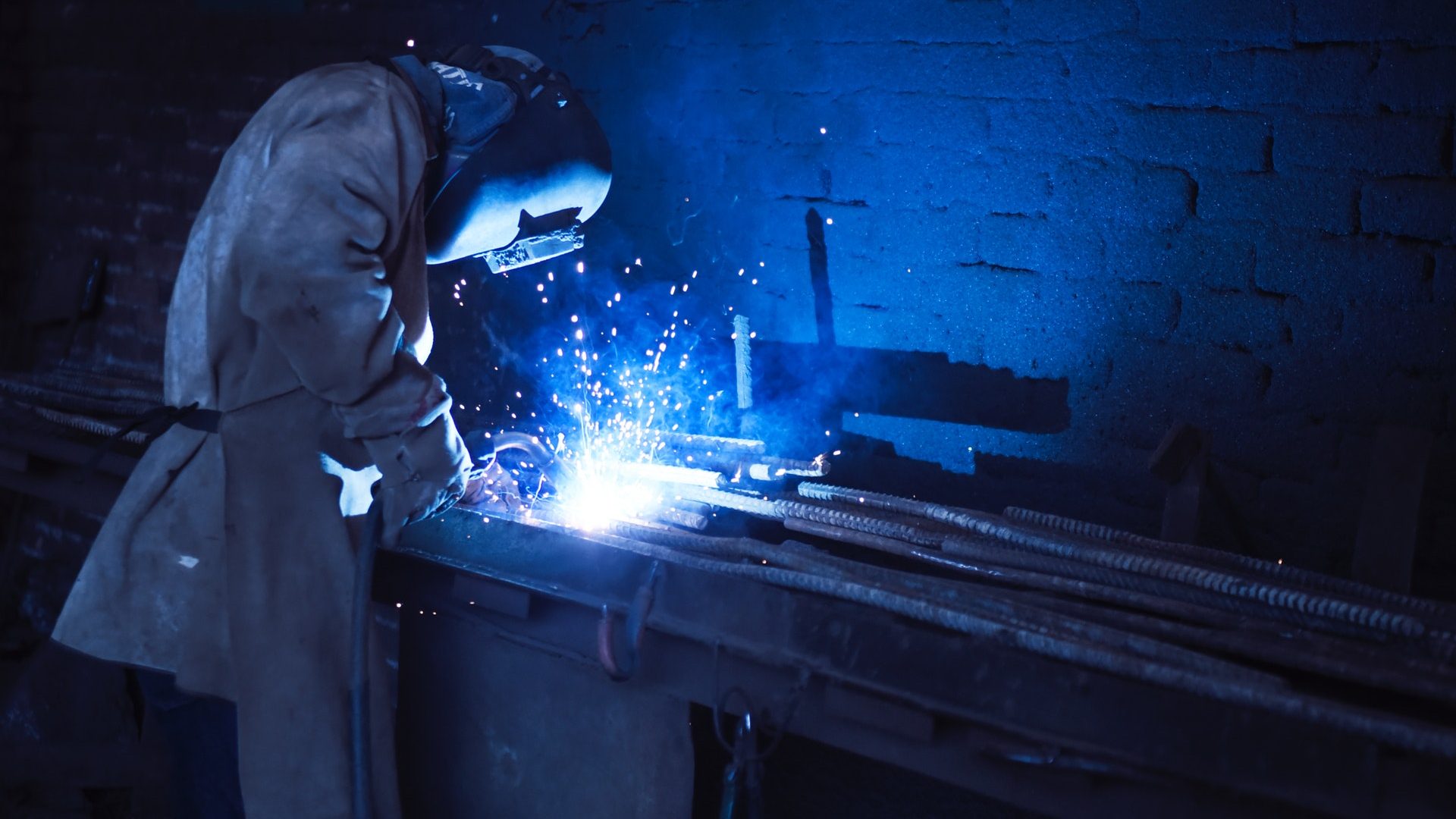 factory male worker welding
